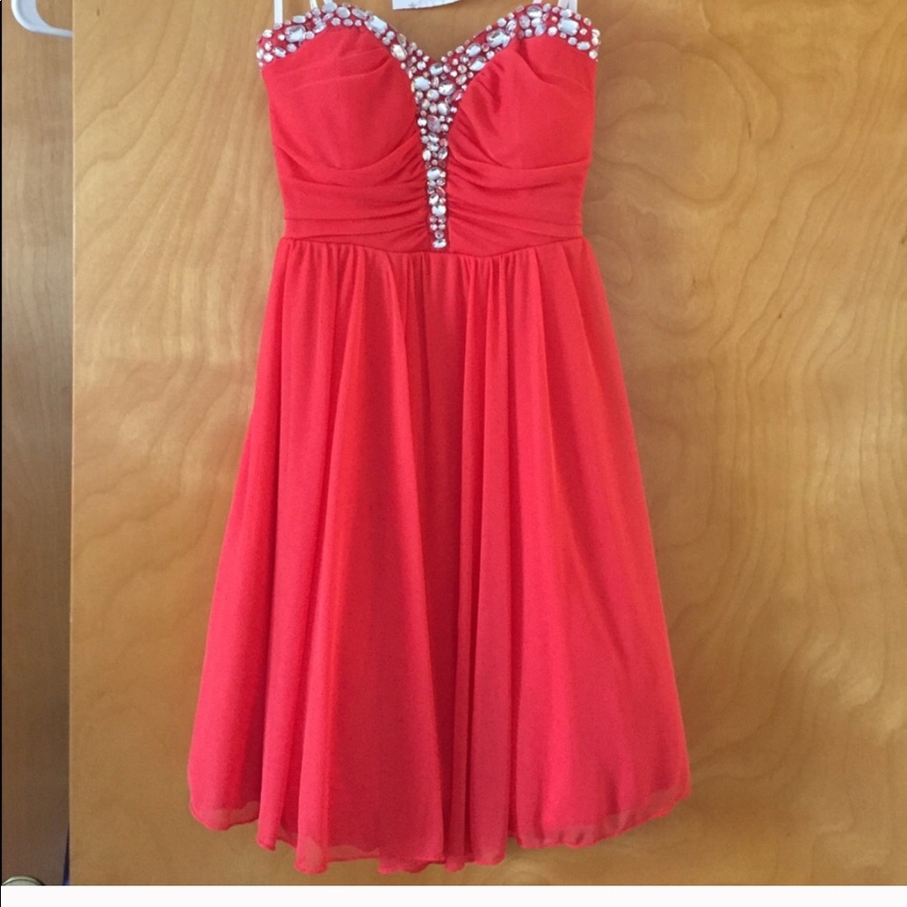 Prom dress. Reddish orange